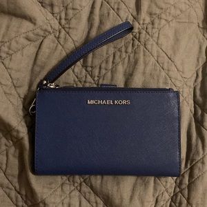 Wallet never used brand new. Navy Blue
